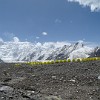 The tents and the outhouse of the base camp on the South Engilchek Glacier. The climbing season in Central Tian Shan takes only one month, from mid of July to mid of August. And exactly so long exists this base camp.